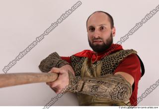 MARCUS LAYING POSE WITH SPEAR